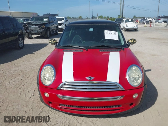 2006 MINI Hardtop with VIN WMWRC33506TK17012, listed as a IAAI auction lot 42076648 with 101,852 mi miles and . Bid and sale history available at DreamBid. Image 12.