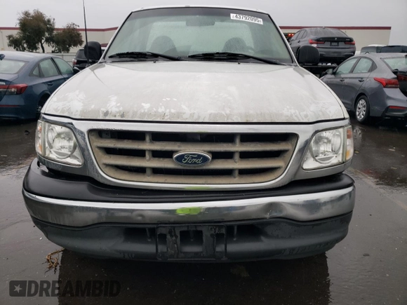 2001 Ford F-150 XL with VIN 3FTZF17231MA21619, listed as a Copart auction lot 43792095 with 529,161 mi miles and Clean title. Bid and sale history available at DreamBid. Image 5.