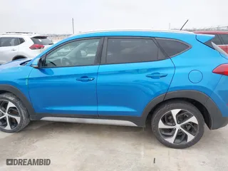 2017 Hyundai Tucson Value with VIN KM8J33A20HU474754, listed as a IAAI auction lot 41353343 with 152,897 mi miles. Bid and sale history available at carsss.com. Image 14.