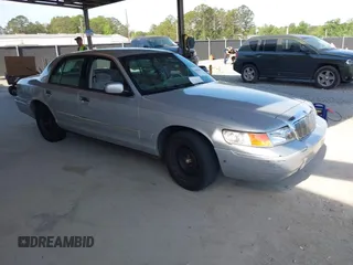 1999 Mercury Grand Marquis GS z VIN 2MEFM74W0XX642024, wystawiony jako IAAI lot #42090607 z przebiegiem 96 114 mil mil oraz . Historia ofert i sprzedaży dostępna na DreamBid. Obrazek 1.