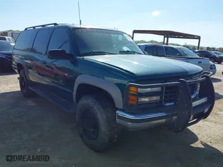 1999 GMC Suburban with VIN 3GKGK26J4XG508566, listed as a IAAI auction lot 41778760 with 1,028,244 mi miles. Bid and sale history available at carsss.com. Image 1.