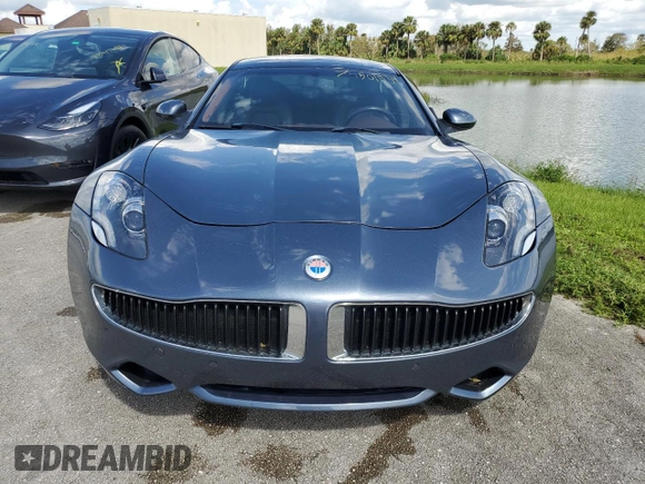 2012 Fisker Karma EcoSport z VIN YH4K14AA3CA001524, wystawiony jako Copart lot #74501534 z przebiegiem 15 969 mil mil oraz Nie do naprawy. Historia ofert i sprzedaży dostępna na DreamBid. Obrazek 5.