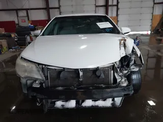 2014 Toyota Camry L with VIN 4T1BF1FKXEU306754, listed as a IAAI auction lot 41613218 with 195,692 mi miles. Bid and sale history available at carsss.com. Image 12.