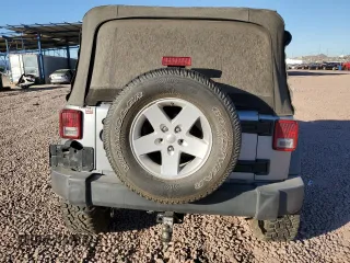 2018 Jeep Wrangler JK Unlimited Sport S with VIN 1C4HJWDG4JL925942, listed as a Copart auction lot 79222724 with 107,036 mi miles and Salvage Title. Bid and sale history available at carsss.com. Image 6.