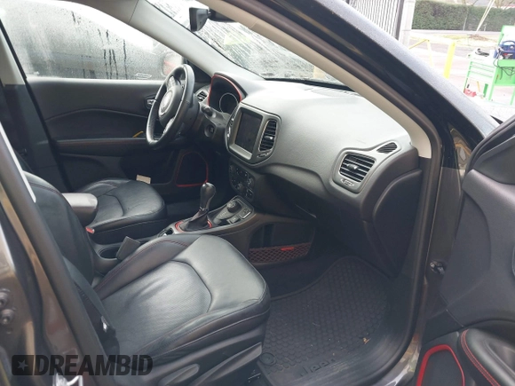 2017 Jeep Compass Trailhawk with VIN 3C4NJDDB9HT657173, listed as a IAAI auction lot 41613348 with 60,781 mi miles and . Bid and sale history available at DreamBid. Image 5.