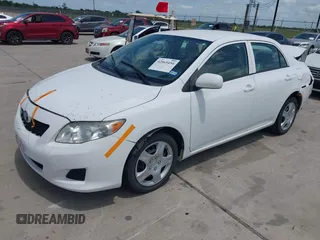 2010 Toyota Corolla with VIN 1NXBU4EE2AZ288893, listed as a IAAI auction lot 42065454 with 140,064 mi miles. Bid and sale history available at carsss.com. Image 2.