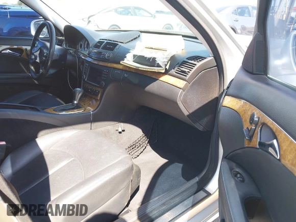 2007 Mercedes-Benz E-Class 3.5L with VIN WDBUF56X07B174780, listed as a IAAI auction lot 42007204 with 150,527 mi miles. Bid and sale history available at carsss.com. Image 5.