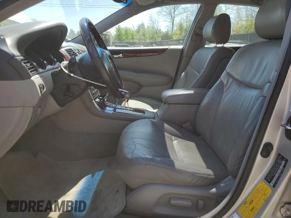 2003 Lexus ES 300 with VIN JTHBF30G230131052, listed as a Copart auction lot 53727255 with 122,755 mi miles and Salvage Title. Bid and sale history available at DreamBid. Image 7.