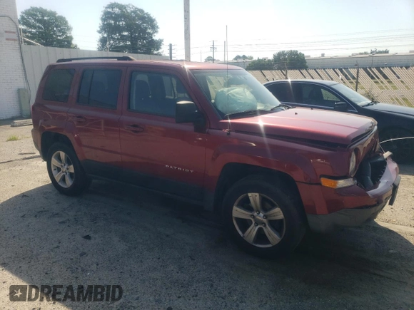 2015 Jeep Patriot Sport with VIN 1C4NJRBB5FD239678, listed as a Copart auction lot 61937455 with 211,165 mi miles and Salvage title. Bid and sale history available at DreamBid. Image 4.