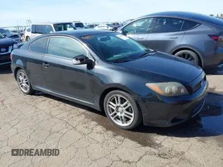 2009 Scion tC with VIN JTKDE167090284572, listed as a IAAI auction lot 41808769 with 132,474 mi miles. Bid and sale history available at carsss.com. Image 1.