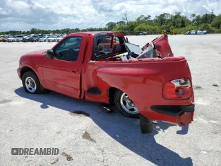 2002 Ford F-150 XL z VIN 1FTRF07202KB68581, wystawiony jako Copart lot #60276095 z przebiegiem 164 754 mil mil oraz Szkoda całkowita • Salvage title. Historia ofert i sprzedaży dostępna na DreamBid. Obrazek 2.
