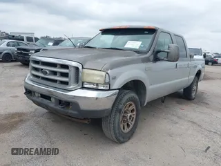 2001 Ford Super Duty F-250 XL with VIN 1FTNW21S31EC77648, listed as a IAAI auction lot 41523954 with 218,035 mi miles. Bid and sale history available at carsss.com. Image 2.