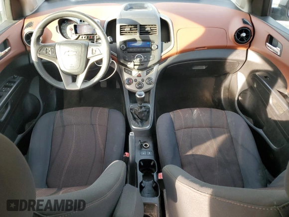 2012 Chevrolet Sonic LT with VIN 1G1JD5SH0C4231267, listed as a Copart auction lot 82848544 with 115,159 mi miles and Salvage title. Bid and sale history available at DreamBid. Image 8.