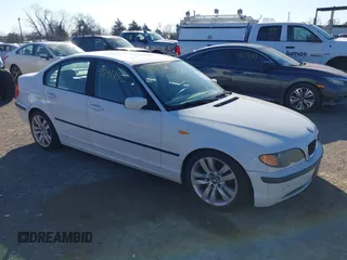 2002 BMW 3 Series 325i with VIN WBAET37492NG77657, listed as a IAAI auction lot 41691705 with 163,700 mi miles. Bid and sale history available at carsss.com. Image 1.