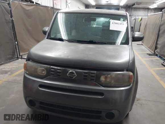 2011 Nissan Cube 1.8 SL with VIN JN8AZ2KR2BT212311, listed as a IAAI auction lot 42002493 with 128,372 mi miles. Bid and sale history available at carsss.com. Image 6.
