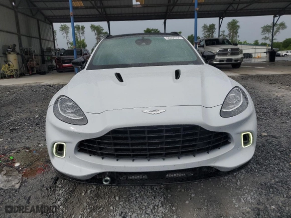 2021 Aston Martin DBX with VIN SCFVUJAW8MTV01405, listed as a Copart auction lot 56564704 with 12,386 mi miles and Salvage Title. Bid and sale history available at carsss.com. Image 5.