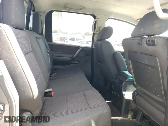 2014 Nissan Titan SV with VIN 1N6BA0ED0EN517002, listed as a Copart auction lot 57885435 with 139,910 mi miles and Salvage title. Bid and sale history available at DreamBid. Image 10.