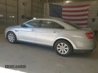 2011 Ford Taurus SE with VIN 1FAHP2DW6BG116196, listed as a Copart auction lot 52441955 with 201,487 mi miles and Salvage Title. Bid and sale history available at DreamBid. Image 2.