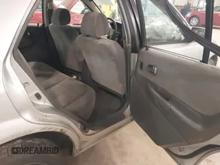 2000 Mazda Protege DX with VIN JM1BJ2226Y0206340, listed as a IAAI auction lot 41645396 with 238,500 mi miles and . Bid and sale history available at DreamBid. Image 8.