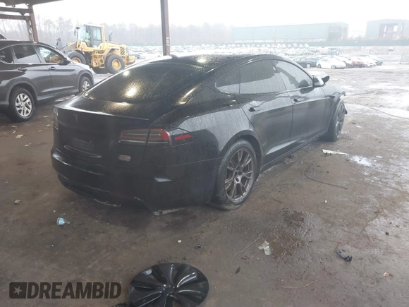 2022 Tesla Model S Plaid with VIN 5YJSA1E64NF477855, listed as a IAAI auction lot 41470591 with Not provided miles and . Bid and sale history available at DreamBid. Image 4.