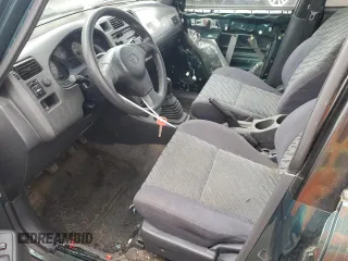 1999 Toyota RAV4 with VIN JT3GP10V2X0037464, listed as a Copart auction lot 54732085 with 306,550 mi miles and Clean Title. Bid and sale history available at DreamBid. Image 7.