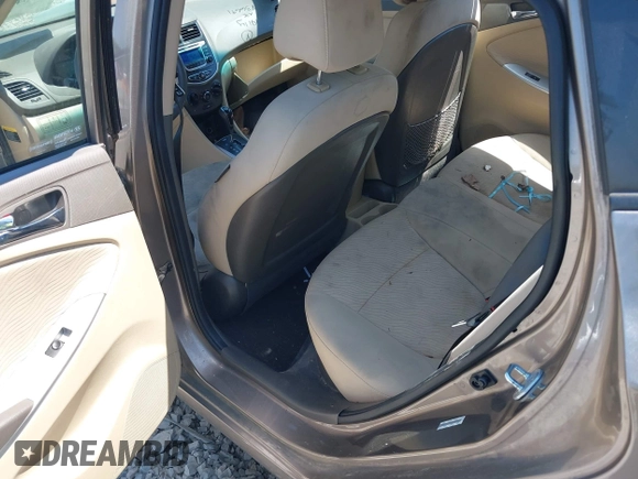 2014 Hyundai Accent GLS with VIN KMHCU4AE7EU736691, listed as a IAAI auction lot 42054514 with 80,715 mi miles and . Bid and sale history available at carsss.com. Image 8.