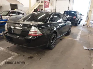 2008 Ford Taurus Limited with VIN 1FAHP28W48G109444, listed as a IAAI auction lot 40749405 with 244,061 mi miles. Bid and sale history available at carsss.com. Image 4.