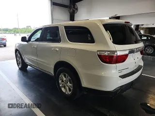 2013 Dodge Durango SXT with VIN 1C4RDJAG8DC671689, listed as a IAAI auction lot 42743958 with 160,950 mi miles and . Bid and sale history available at DreamBid. Image 28.