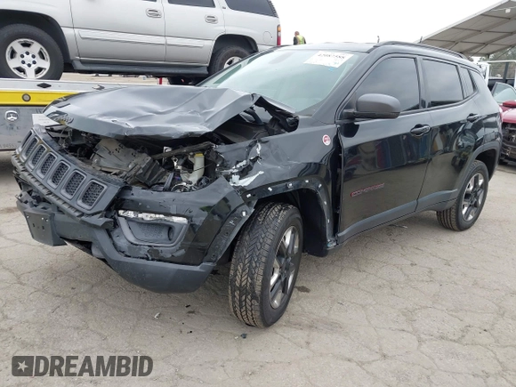 2018 Jeep Compass Trailhawk with VIN 3C4NJDDB3JT451658, listed as a IAAI auction lot 42087588 with 90,189 mi miles and . Bid and sale history available at DreamBid. Image 2.
