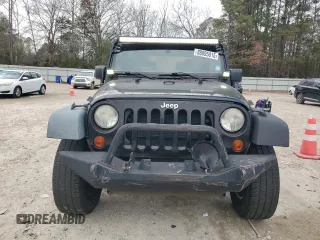 2012 Jeep Wrangler Sport with VIN 1C4GJWAG6CL167329, listed as a Copart auction lot 88895815 with 147,448 mi miles and Clean Title. Bid and sale history available at DreamBid. Image 5.