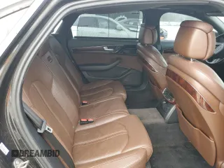 2012 Audi A8 с VIN WAURVAFD4CN017834, выставлен на аукционе Copart как лот 56951795 с пробегом 154 564 миль миль и Списание • Salvage title. История ставок и продаж доступна на DreamBid. Изображение 10.