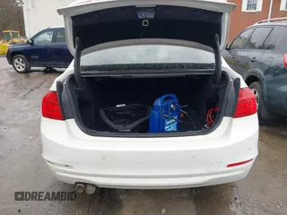 2014 BMW 3 Series 328i xDrive with VIN WBA3B5C56EF599323, listed as a IAAI auction lot 41853533 with 114,358 mi miles. Bid and sale history available at carsss.com. Image 16.