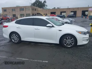 2016 Kia Optima LX with VIN 5XXGT4L30GG049534, listed as a IAAI auction lot 41770579 with 94,257 mi miles. Bid and sale history available at carsss.com. Image 14.