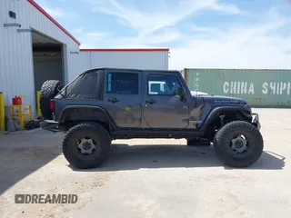 2014 Jeep Wrangler Unlimited Rubicon с VIN 1C4BJWFG2EL279938, выставлен на аукционе IAAI как лот 41920729 с пробегом 76 418 миль миль и . История ставок и продаж доступна на DreamBid. Изображение 14.