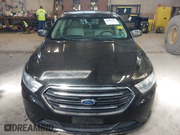 2015 Ford Taurus Limited with VIN 1FAHP2J87FG172580, listed as a IAAI auction lot 41891567 with 183,784 mi miles. Bid and sale history available at carsss.com. Image 12.