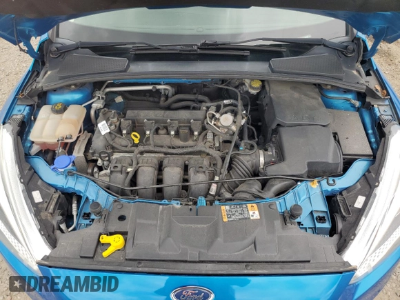 2016 Ford Focus SE z VIN 1FADP3F21GL386580, wystawiony jako Copart lot #63326425 z przebiegiem 82 139 mil mil oraz Szkoda całkowita • Salvage title. Historia ofert i sprzedaży dostępna na DreamBid. Obrazek 11.