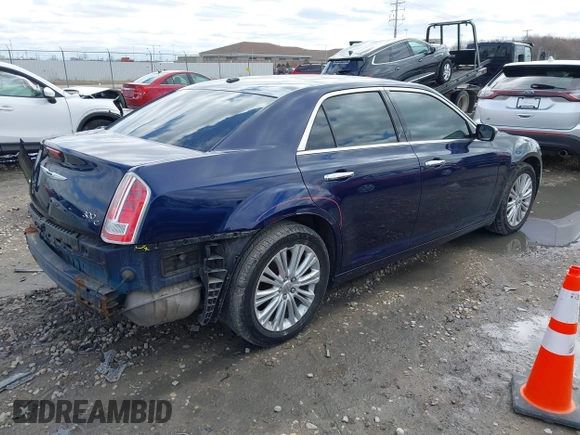 2014 Chrysler 300 C with VIN 2C3CCAKG2EH273209, listed as a IAAI auction lot 41955858 with 112,742 mi miles and . Bid and sale history available at carsss.com. Image 4.