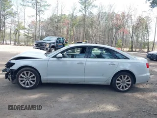 2014 Audi A6 Premium Plus with VIN WAUGFAFC0EN015674, listed as a IAAI auction lot 41879910 with 142,398 mi miles and . Bid and sale history available at DreamBid. Image 15.