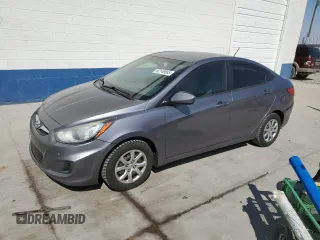 2014 Hyundai Accent GLS with VIN KMHCT4AE1EU696482, listed as a Copart auction lot 62149665 with 171,618 mi miles and Salvage title. Bid and sale history available at DreamBid. Image 1.