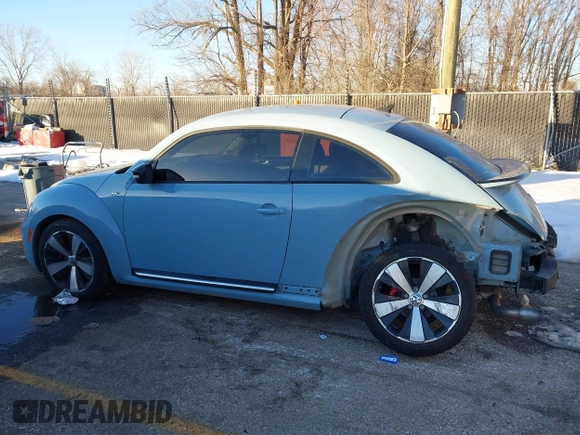 2014 Volkswagen Beetle Turbo R-Line with VIN 3VWVT7AT9EM661347, listed as a IAAI auction lot 41336295 with 61,068 mi miles and . Bid and sale history available at DreamBid. Image 14.