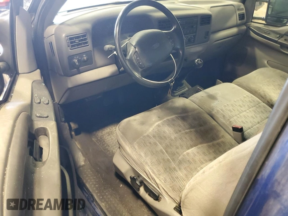 1999 Ford Super Duty F-250 XL with VIN 1FTNF21F2XEB09589, listed as a Copart auction lot 50700795 with 292,135 mi miles and Salvage Title. Bid and sale history available at carsss.com. Image 8.
