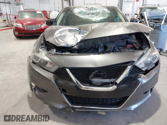 2018 Nissan Maxima SL z VIN 1N4AA6APXJC374220, wystawiony jako IAAI lot #42018130 z przebiegiem 119 776 mil mil oraz . Historia ofert i sprzedaży dostępna na DreamBid. Obrazek 12.