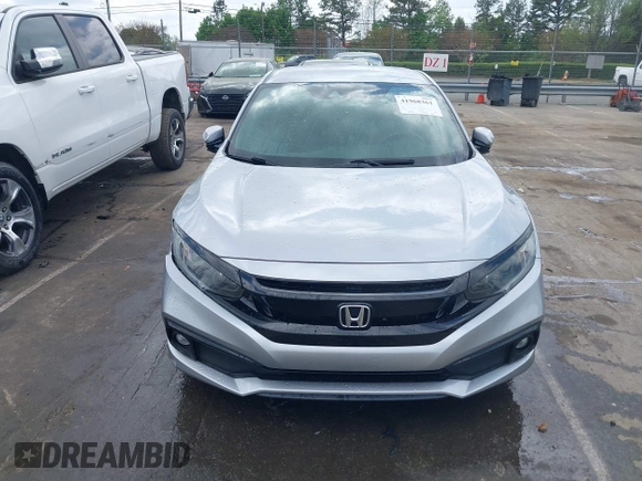 2021 Honda Civic Sport with VIN 2HGFC2F88MH530214, listed as a IAAI auction lot 41968361 with 60,869 mi miles and . Bid and sale history available at DreamBid. Image 12.