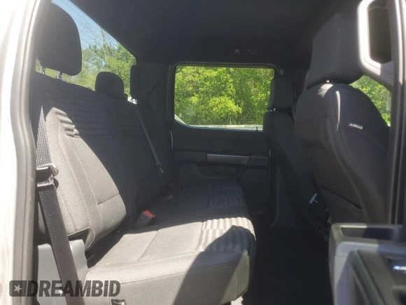 2023 Ford F-150 XL with VIN 1FTFW1E55PKF18784, listed as a Copart auction lot 52807315 with 15,284 mi miles and Salvage Title. Bid and sale history available at carsss.com. Image 10.