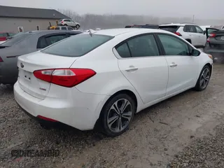 2015 Kia Forte EX with VIN KNAFZ4A86F5300520, listed as a IAAI auction lot 41473046 with 214,971 mi miles. Bid and sale history available at carsss.com. Image 4.