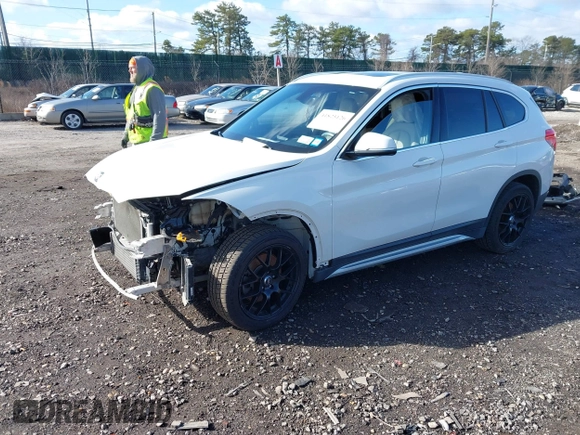 2018 BMW X1 xDrive28i with VIN WBXHT3C34J5L29714, listed as a IAAI auction lot 41825126 with 89,970 mi miles. Bid and sale history available at carsss.com. Image 19.
