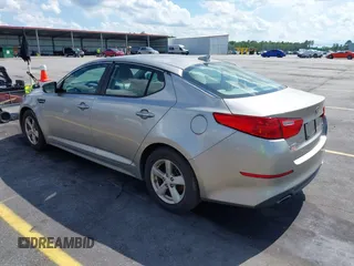 2015 Kia Optima LX with VIN 5XXGM4A79FG477619, listed as a IAAI auction lot 42561432 with 125,274 mi miles and . Bid and sale history available at DreamBid. Image 3.