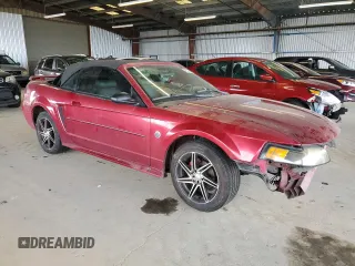 2004 Ford Mustang Deluxe z VIN 1FAFP44654F204619, wystawiony jako Copart lot #62414685 z przebiegiem 235 467 mil mil oraz Szkoda całkowita • Salvage title. Historia ofert i sprzedaży dostępna na DreamBid. Obrazek 4.