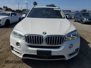 2014 BMW X5 xDrive50i z VIN 5UXKR6C55E0C03032, wystawiony jako Copart lot #57274505 z przebiegiem 107 963 mil mil oraz Czysty tytuł • Clean title. Historia ofert i sprzedaży dostępna na DreamBid. Obrazek 5.