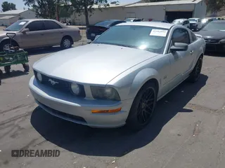 2006 Ford Mustang GT Deluxe with VIN 1ZVHT82H365238039, listed as a IAAI auction lot 42582693 with 129,327 mi miles and . Bid and sale history available at DreamBid. Image 2.